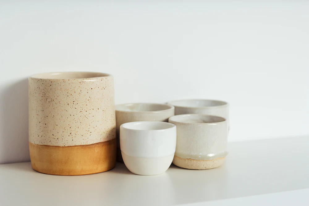 Handmade ceramic objects arranged as artful gifts